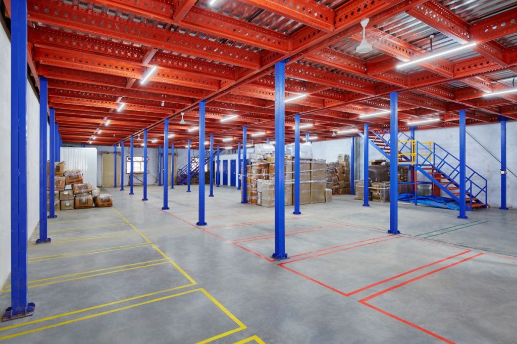 Modern warehouse interior with storage container system for efficient logistics and inventory handling.